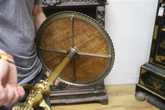 A circular specimen marble top brass tripod table, Diameter 38cm, H.72cm